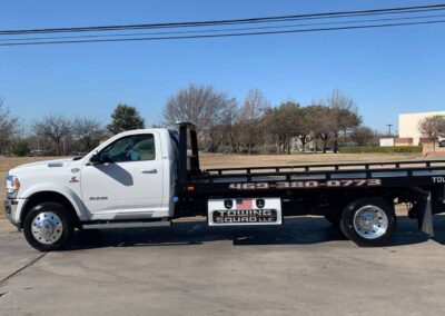 White RAM Flatbed Towing Truck